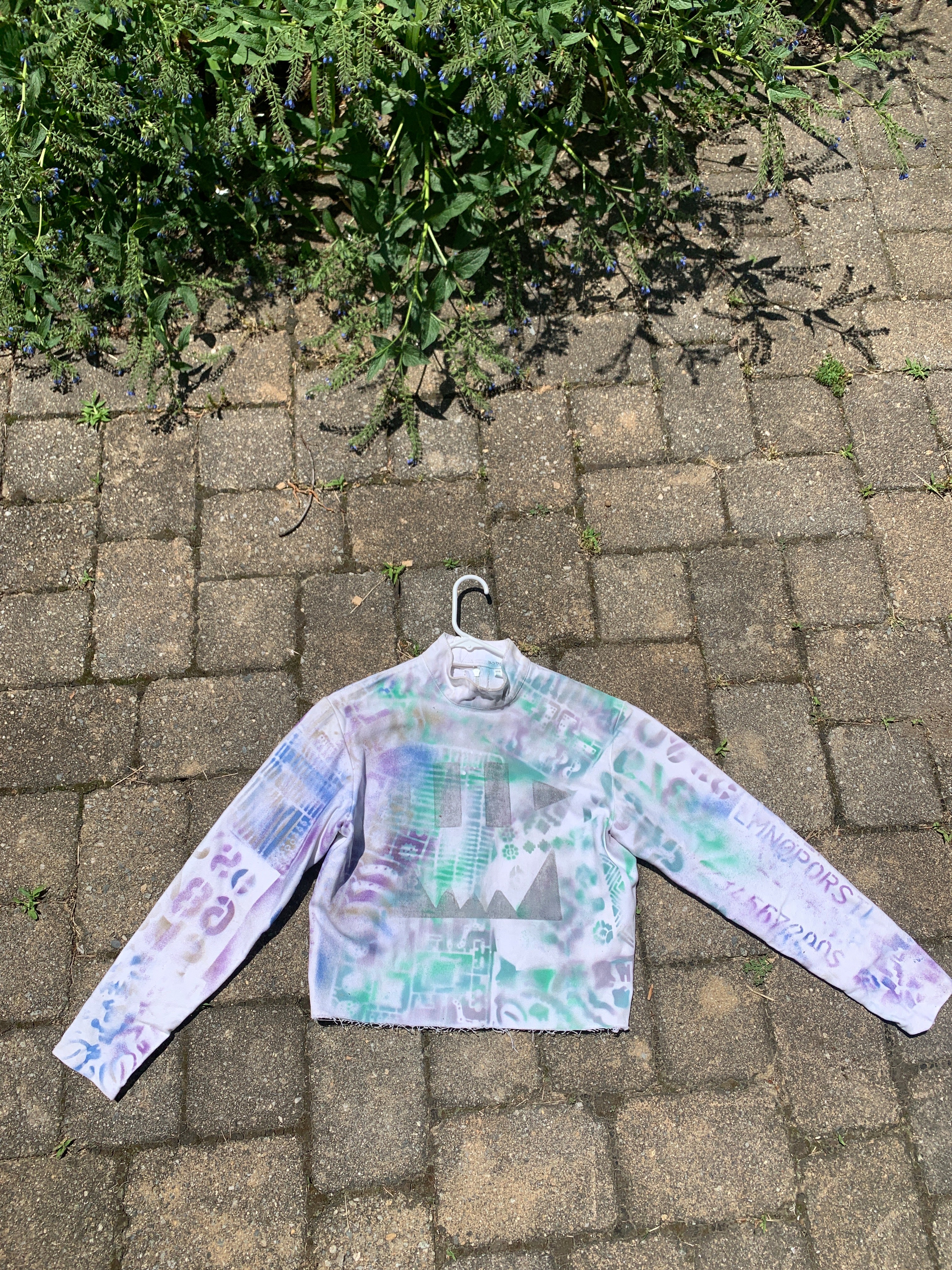 Spray painted fencing jacket