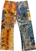 Colorful patterned pants with a red drawstring on a white background